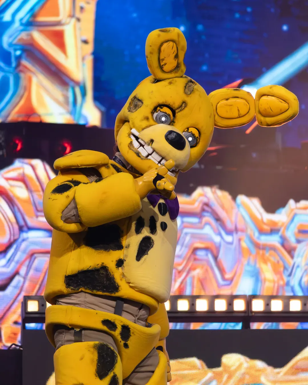 A cosplayer featuring Springtrap from Five Nights at Freddy's.